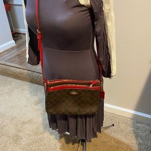 Brown and red coach bag